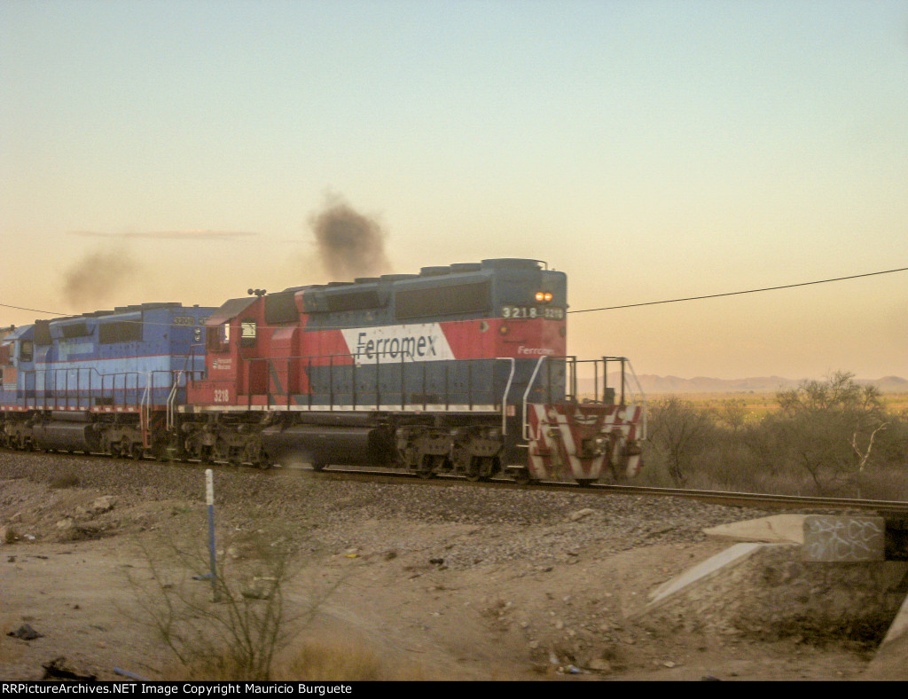 FXE SD40-2 leading a train Long hood forward